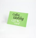 Green gift card with 'Coffee tasting' text on a white background